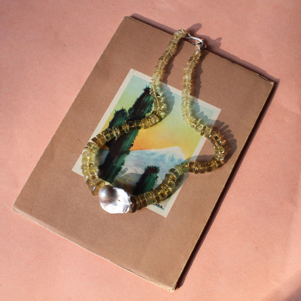Lemon Quartz bead and Baroque Pearl.